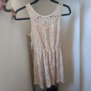 Nude/Cream lace dress with cute bow on back